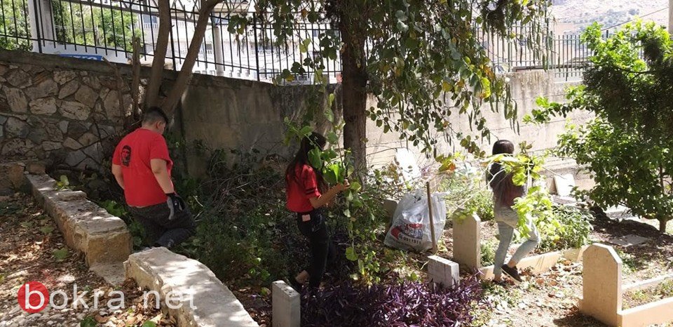 البعنة: الشبيبة الشيوعية تنظفّ المقبرة استقبالاً للعيد-6
