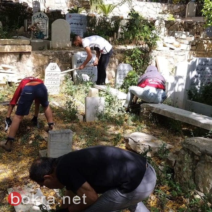 البعنة: الشبيبة الشيوعية تنظفّ المقبرة استقبالاً للعيد-9