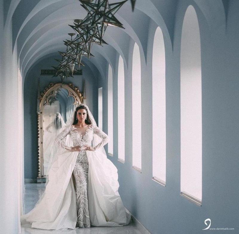 الصور الأولى لزفاف درة.. فستان أبيض ساحر من تصميم لبناني-1