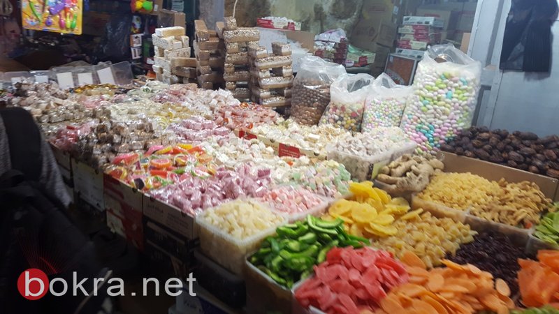 القدس: سوق القطانين يزدحم بالمتسوقين في شهر رمضان-5
