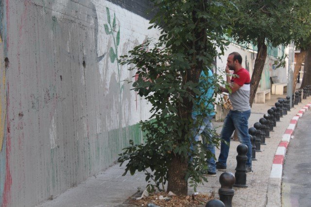 شرطة الناصرة ترافق رسم الجداريات الوطنية كخطوة استفزازية وتصور المشاركين-13