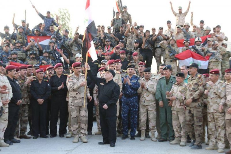 العبادي يعلن تحرير الموصل بالكامل على يد القوات العراقية-1