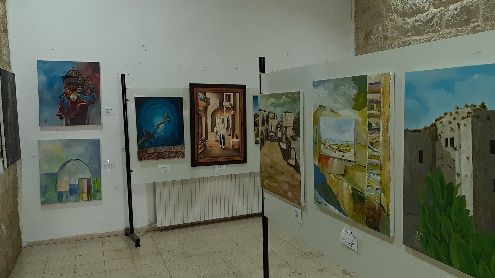 الفنان العكي منير قزموز يشارك في معرض (تواصل للفن التشكيلي) بمدينة رام الله-2