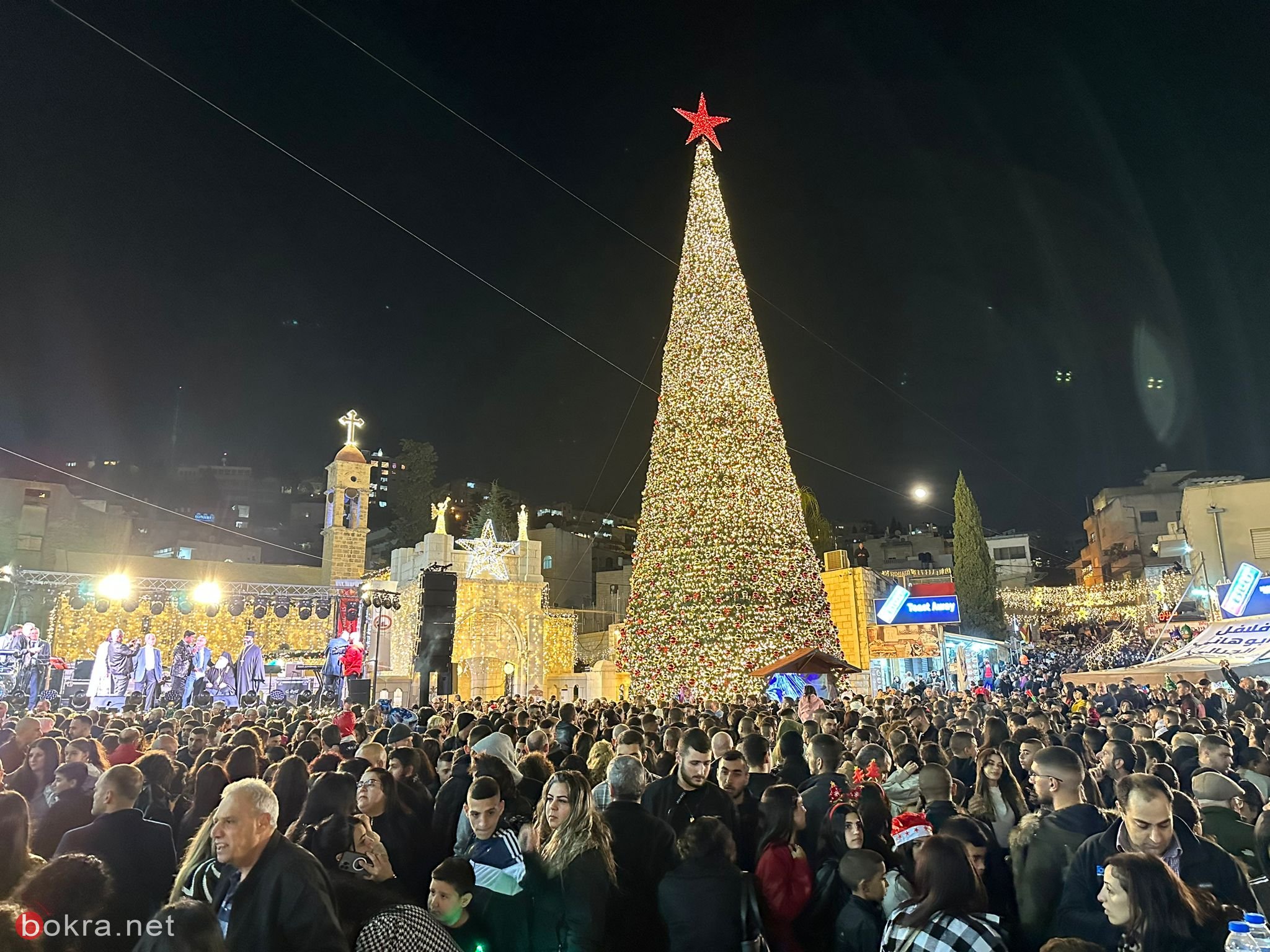الناصرة: الاف المشاركين في احتفال اضاءة شجرة عيد الميلاد في ساحة العين-3