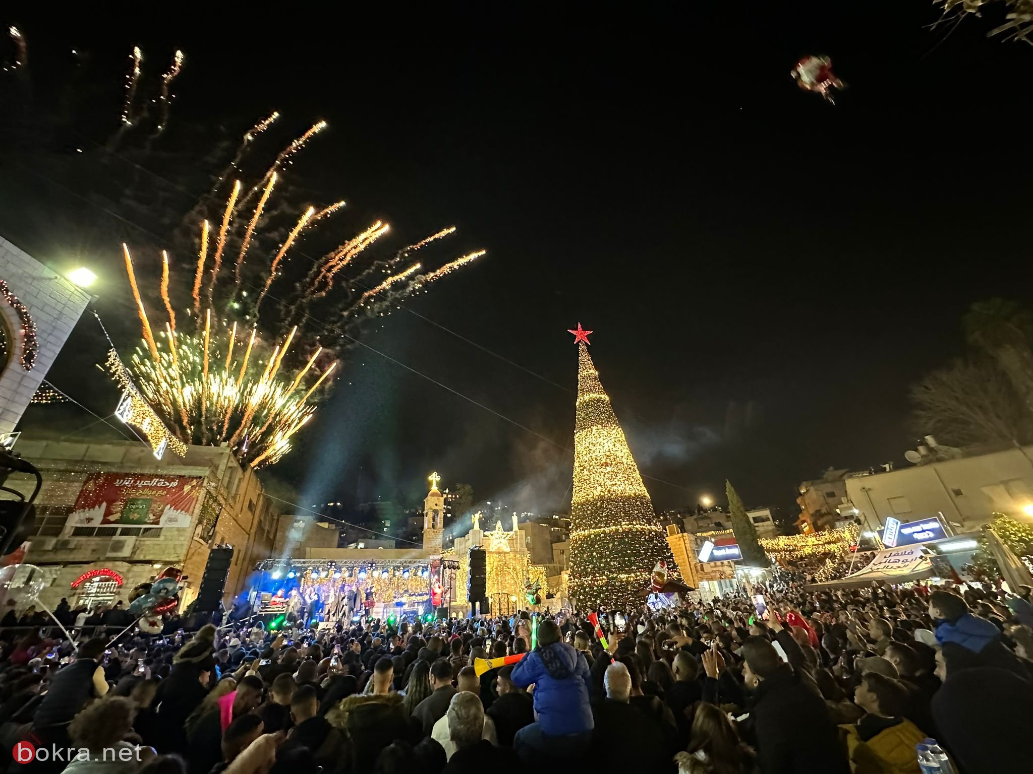 الناصرة: الاف المشاركين في احتفال اضاءة شجرة عيد الميلاد في ساحة العين-13