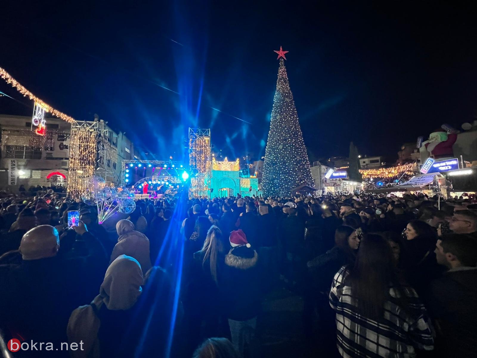 الناصرة: الاف المشاركين في احتفال اضاءة شجرة عيد الميلاد في ساحة العين-2