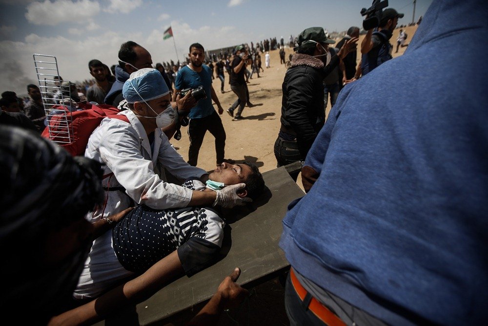 ارتفاع عدد شهداء مجزرة غزة إلى 65 شهيدا-5