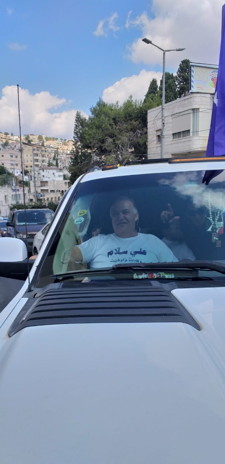 سلام  وداعموه يوزعون المنشور الأول لقائمة ناصرتي في شوارع الناصرة-0