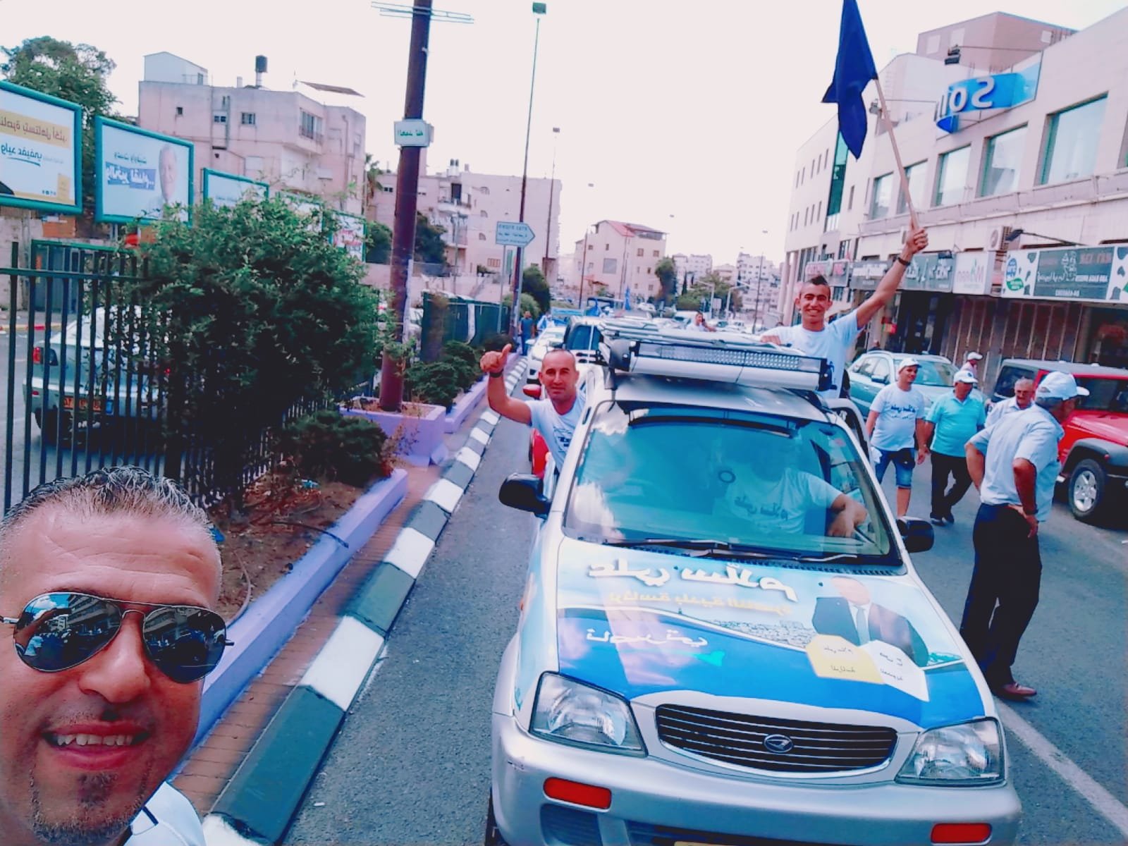 سلام  وداعموه يوزعون المنشور الأول لقائمة ناصرتي في شوارع الناصرة-9