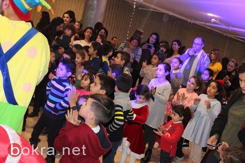 السكان العرب يحتفلون بالميلاد في كريسماس ماركت نتسيرت عيليت‎-13