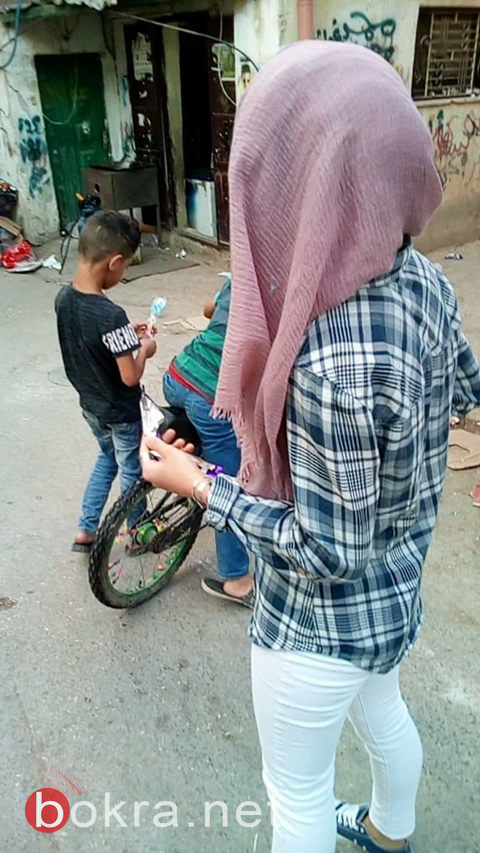 "طاقات شبابية" تجوب بالبسمة شوارع مخيم الجلزون-14