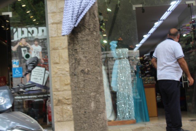 عشية عيد الفطر، المحلات التجارية وأسواق الناصرة تخلوا من الزائرين ولكن هذه المرة ليس بسبب "جنين"-14
