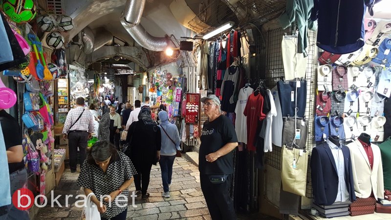 عشية العيد..حركة تجارية ضعيفة تخيم على اسواق القدس-2