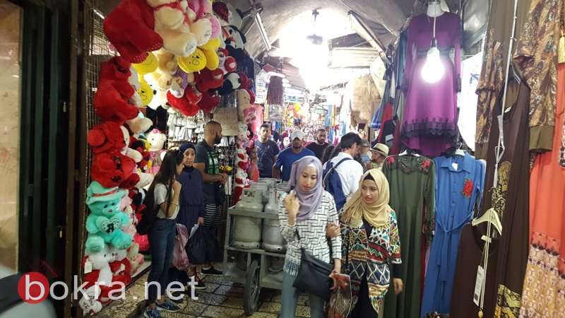 عشية العيد..حركة تجارية ضعيفة تخيم على اسواق القدس-14