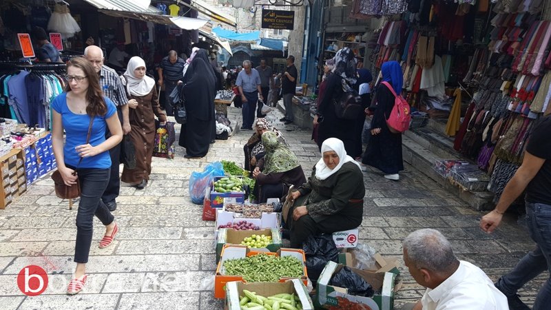 عشية العيد..حركة تجارية ضعيفة تخيم على اسواق القدس-21