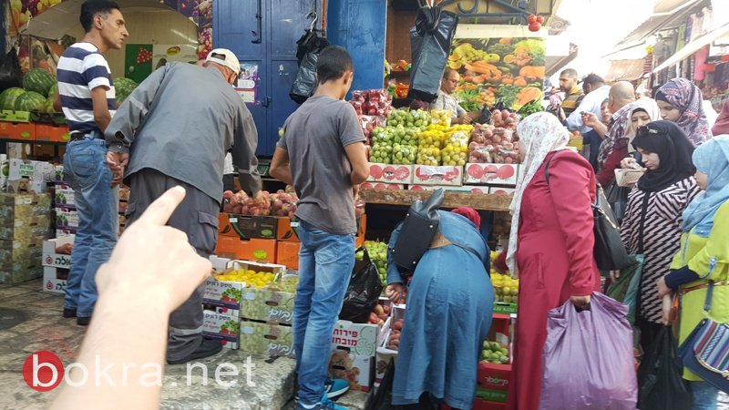 عشية العيد..حركة تجارية ضعيفة تخيم على اسواق القدس-27