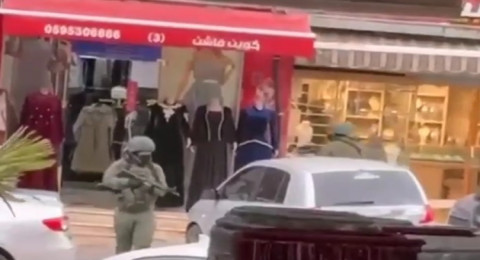 سطو في الخليل