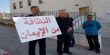  مواطنان فحماويان يتظاهران ضد النفايات مقابل البلدية 